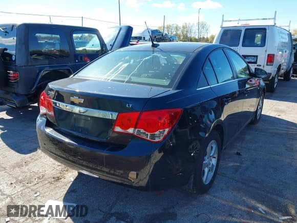 ✅ 2014 Chevrolet Cruze 1LT • VIN: 1G1PC5SB6E7365436 • Lot: 43484529. Listed on IAAI with 130,672 mi. Free auction sales archive from the USA and detailed vehicle history report at DreamBid. Image 4.