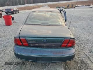 ✅ 1999 Chevrolet Lumina • VIN: 2G1WL52M0X9205910 • Lot: 94118345. Listed on Copart with 143,165 mi. Free auction sales archive from the USA and detailed vehicle history report at DreamBid. Image 6.