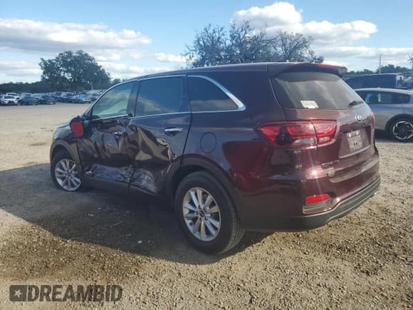 ✅ 2019 Kia Sorento LX • VIN: 5XYPGDA59KG450108 • Лот: 87064665. Опубликован ранее на Copart с пробегом 159 430 миль. Бесплатный доступ к архиву аукционных продаж из США и подробный отчёт об истории автомобиля на DreamBid. Изображение 2.