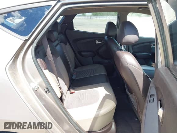 2013 Hyundai Tucson GLS z VIN KM8JU3AC5DU624633, wystawiony jako IAAI lot #42366217 z przebiegiem 108 258 mil mil oraz . Historia ofert i sprzedaży dostępna na DreamBid. Obrazek 8.