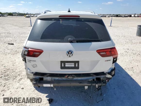 ✅ 2020 Volkswagen Tiguan SEL Premium R-Line • VIN: 3VV4B7AX1LM181516 • Лот: 86482585. Опубликован ранее на Copart с пробегом 62 383 миль. Бесплатный доступ к архиву аукционных продаж из США и подробный отчёт об истории автомобиля на DreamBid. Изображение 6.