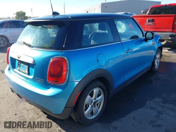 ✅ 2015 MINI Hardtop • VIN: WMWXM5C59FT942625 • Lot: 43552027. Listed on IAAI with 140,338 mi. Free auction sales archive from the USA and detailed vehicle history report at DreamBid. Image 4.