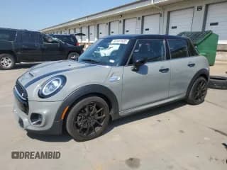 ✅ 2021 MINI Hardtop 4 Door Cooper S • VIN: WMWXU9C07M2N82639 • Lot: 62487635. Wystawiony na Copart z przebiegiem 20 204 mil. Bezpłatny archiwum sprzedaży aukcyjnych z USA i szczegółowy raport historii pojazdu na DreamBid. Zdjęcie 1.