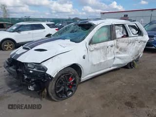 ✅ 2023 Dodge Durango SRT Hellcat • VIN: 1C4SDJH98PC613790 • Lot: 43305259. Listed on IAAI with 5,177 mi. Free auction sales archive from the USA and detailed vehicle history report at DreamBid. Image 2.