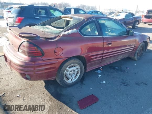 ✅ 2000 Pontiac Grand Am • VIN: 1G2NE12T5YM799819 • Lot: 43827279. Listed on IAAI with 167,017 mi. Free auction sales archive from the USA and detailed vehicle history report at DreamBid. Image 4.