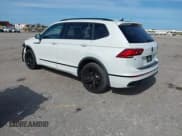 ✅ 2023 Volkswagen Tiguan SE R-Line Black • VIN: 3VVCB7AX0PM090710 • Lot: 41256904. Wystawiony na IAAI z przebiegiem 12 819 mil. Bezpłatny archiwum sprzedaży aukcyjnych z USA i szczegółowy raport historii pojazdu na DreamBid. Zdjęcie 3.
