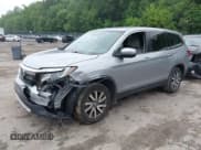 ✅ 2021 Honda Pilot EX • VIN: 5FNYF5H36MB039437 • Lot: 42542622. Listed on IAAI with 65,098 mi. Free auction sales archive from the USA and detailed vehicle history report at DreamBid. Image 19.