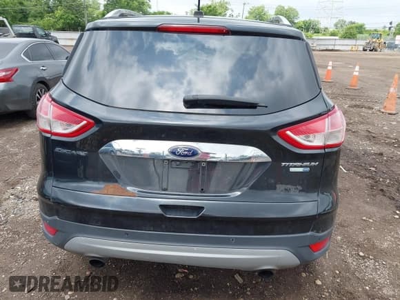 ✅ 2015 Ford Escape Titanium • VIN: 1FMCU9J94FUC39311 • Lot: 42542693. Listed on IAAI with 129,747 mi. Free auction sales archive from the USA and detailed vehicle history report at DreamBid. Image 16.
