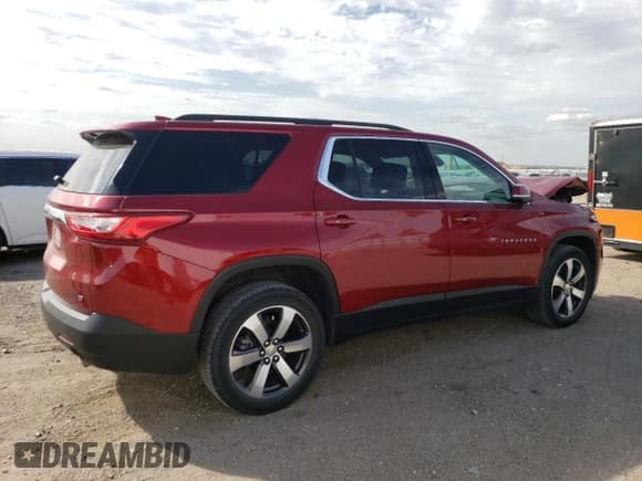 ✅ 2021 Chevrolet Traverse LT • VIN: 1GNEVHKW3MJ164180 • Lot: 71749514. Wystawiony na Copart z przebiegiem 36 650 mil. Bezpłatny archiwum sprzedaży aukcyjnych z USA i szczegółowy raport historii pojazdu na DreamBid. Zdjęcie 3.