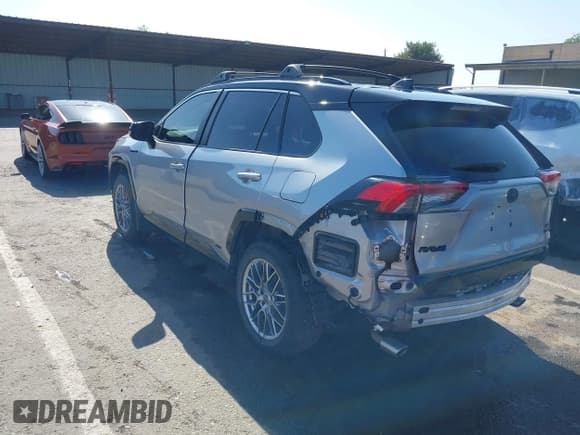 ✅ 2021 Toyota RAV4 Hybrid XSE • VIN: 4T3E6RFVXMU016087 • Lot: 42136592. Listed on IAAI with 89,374 mi. Free auction sales archive from the USA and detailed vehicle history report at DreamBid. Image 3.