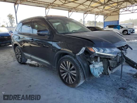 2019 Mitsubishi Outlander SE with VIN JA4AD3A32KZ017023, listed as a Copart auction lot 82741075 with 86,259 mi miles and Clean title. Bid and sale history available at DreamBid. Image 4.