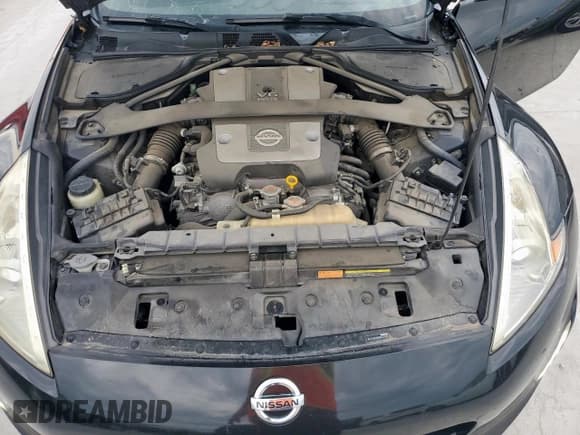 ✅ 2016 Nissan 370Z • VIN: JN1AZ4EH6GM932855 • Лот: 60335075. Опубликован ранее на Copart с пробегом 98 487 миль. Бесплатный доступ к архиву аукционных продаж из США и подробный отчёт об истории автомобиля на DreamBid. Изображение 11.