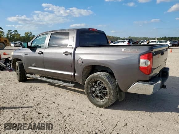 ✅ 2017 Toyota Tundra SR5 • VIN: 5TFEW5F13HX221161 • Lot: 91790625. Listed on Copart with 144,889 mi. Free auction sales archive from the USA and detailed vehicle history report at DreamBid. Image 2.