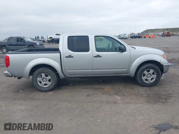 ✅ 2008 Nissan Frontier SE • VIN: 1N6AD07U78C420704 • Lot: 43793144. Listed on IAAI with 187,135 mi. Free auction sales archive from the USA and detailed vehicle history report at DreamBid. Image 13.