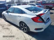 ✅ 2018 Honda Civic Touring • VIN: 19XFC1F90JE000926 • Lot: 41352528. Listed on IAAI with 134,052 mi. Free auction sales archive from the USA and detailed vehicle history report at DreamBid. Image 3.