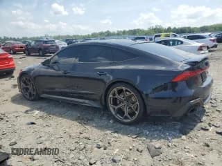 ✅ 2024 Audi RS 7 performance • VIN: WUAPDBF21RN901730 • Лот: 65015945. Опубликован ранее на Copart с пробегом 21 023 миль. Бесплатный доступ к архиву аукционных продаж из США и подробный отчёт об истории автомобиля на DreamBid. Изображение 2.