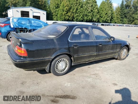 ✅ 1991 Acura Legend • VIN: JH4KA7678MC052112 • Lot: 80012275. Listed on Copart with 83,210 mi. Free auction sales archive from the USA and detailed vehicle history report at DreamBid. Image 3.