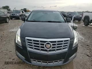 ✅ 2013 Cadillac XTS Luxury • VIN: 2G61P5S39D9245608 • Лот: 72052715. Опубликован ранее на Copart с пробегом 173 831 миль. Бесплатный доступ к архиву аукционных продаж из США и подробный отчёт об истории автомобиля на DreamBid. Изображение 5.