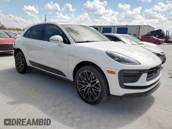 ✅ 2023 Porsche Macan • VIN: WP1AA2A56PLB08380 • Lot: 85118345. Listed on Copart with 26,147 mi. Free auction sales archive from the USA and detailed vehicle history report at DreamBid. Image 4.