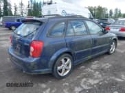 ✅ 2003 Mazda Protege • VIN: JM1BJ245031117566 • Lot: 42349853. Wystawiony na IAAI z przebiegiem 152 784 mil. Bezpłatny archiwum sprzedaży aukcyjnych z USA i szczegółowy raport historii pojazdu na DreamBid. Zdjęcie 4.