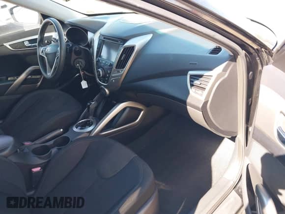 2012 Hyundai Veloster w/Black Int with VIN KMHTC6AD8CU046029, listed as a IAAI auction lot 41664151 with 163,523 mi miles and . Bid and sale history available at DreamBid. Image 5.