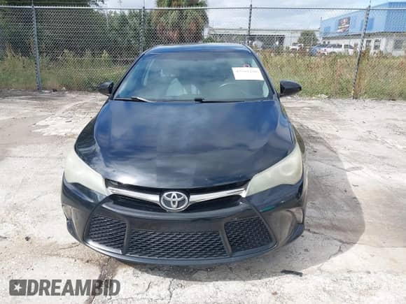 2016 Toyota Camry SE with VIN 4T1BF1FK5GU579815, listed as a IAAI auction lot 43561200 with 98,570 mi miles and . Bid and sale history available at DreamBid. Image 6.