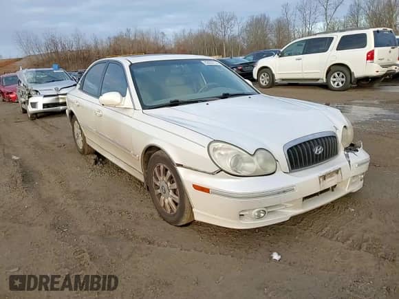 2004 Hyundai Sonata GLS z VIN KMHWF35H84A957433, wystawiony jako Copart lot #82852774 z przebiegiem 187 857 mil mil oraz Szkoda całkowita • Salvage title. Historia ofert i sprzedaży dostępna na DreamBid. Obrazek 10.