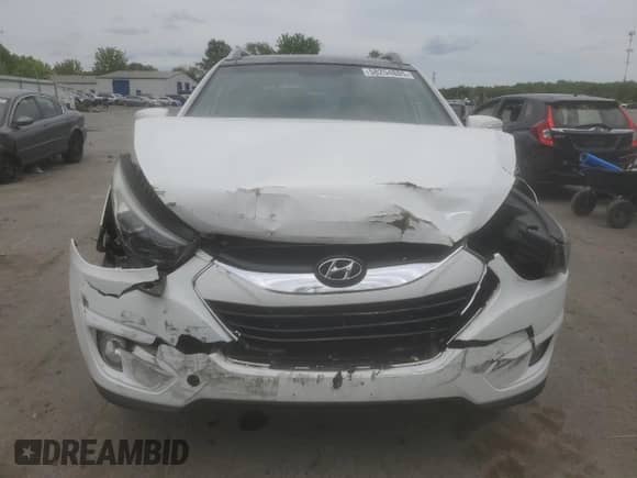2014 Hyundai Tucson SE z VIN KM8JU3AG7EU821288, wystawiony jako Copart lot #58254885 z przebiegiem 104 614 mil mil oraz Szkoda całkowita • Salvage title. Historia ofert i sprzedaży dostępna na DreamBid. Obrazek 5.