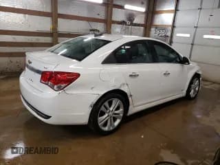 ✅ 2016 Chevrolet Cruze LTZ • VIN: 1G1PG5SB2G7138008 • Lot: 73759652. Listed on Copart with 94,143 mi. Free auction sales archive from the USA and detailed vehicle history report at DreamBid. Image 3.