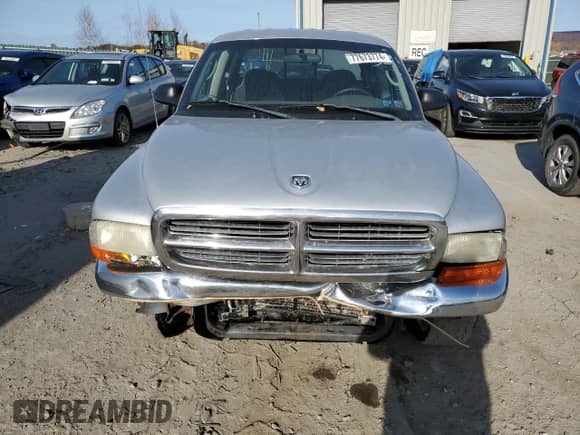 2004 Dodge Dakota SLT z VIN 1D7HL48K24S721847, wystawiony jako Copart lot #77673774 z przebiegiem Nie podano mil oraz Szkoda całkowita • Salvage title. Historia ofert i sprzedaży dostępna na DreamBid. Obrazek 5.