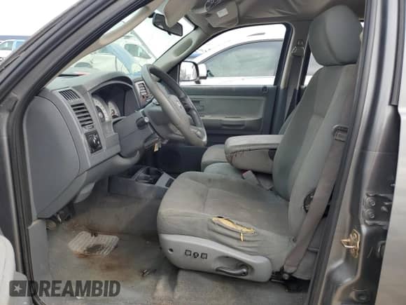 2005 Dodge Dakota SLT с VIN 1D7HE48N05S314132, выставлен на аукционе Copart как лот 62153634 с пробегом 177 064 миль миль и Списание • Salvage title. История ставок и продаж доступна на DreamBid. Изображение 7.