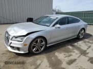 ✅ 2015 Audi S7 • VIN: WAUW2AFC8FN023143 • Lot: 49879934. Listed on Copart with 67,651 mi. Free auction sales archive from the USA and detailed vehicle history report at DreamBid. Image 1.