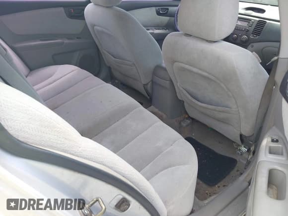✅ 2006 Kia Optima LX • VIN: KNAGE123X65039782 • Lot: 42294795. Listed on IAAI with Not provided. Free auction sales archive from the USA and detailed vehicle history report at DreamBid. Image 8.