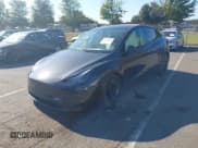 ✅ 2025 Tesla Model Y Long Range • VIN: 7SAYGAEEXSF250779 • Lot: 43353684. Wystawiony na IAAI z przebiegiem 21 203 mil. Bezpłatny archiwum sprzedaży aukcyjnych z USA i szczegółowy raport historii pojazdu na DreamBid. Zdjęcie 2.