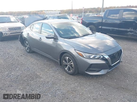 ✅ 2022 Nissan Sentra SV • VIN: 3N1AB8CV7NY205738 • Лот: 43502115. Опубликован ранее на IAAI с пробегом 27 890 миль. Бесплатный доступ к архиву аукционных продаж из США и подробный отчёт об истории автомобиля на DreamBid. Изображение 1.