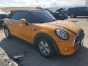 ✅ 2017 MINI Convertible Cooper • VIN: WMWWG5C51H3C19988 • Lot: 68779205. Wystawiony na Copart z przebiegiem 65 985 mil. Bezpłatny archiwum sprzedaży aukcyjnych z USA i szczegółowy raport historii pojazdu na DreamBid. Zdjęcie 4.