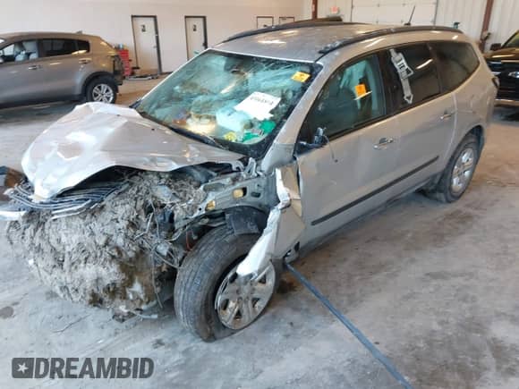 2014 Chevrolet Traverse LS z VIN 1GNKRFED3EJ338191, wystawiony jako IAAI lot #43161854 z przebiegiem Nie podano mil oraz . Historia ofert i sprzedaży dostępna na DreamBid. Obrazek 6.