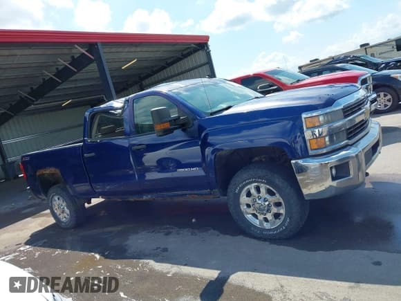 ✅ 2015 Chevrolet Silverado 2500HD LT • VIN: 1GC1KVEG4FF107284 • Lot: 42907719. Listed on IAAI with 313,421 mi. Free auction sales archive from the USA and detailed vehicle history report at DreamBid. Image 13.