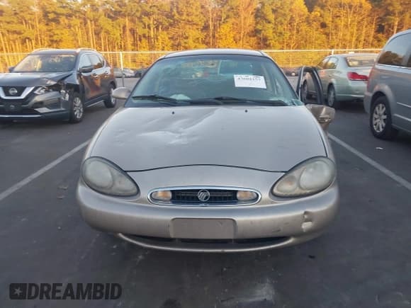 ✅ 1999 Mercury Sable LS • VIN: 1MEFM53SXXA647145 • Lot: 43602157. Listed on IAAI with 184,332 mi. Free auction sales archive from the USA and detailed vehicle history report at DreamBid. Image 12.