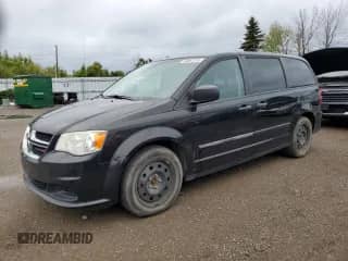 2014 Dodge Grand Caravan SE with VIN 2C4RDGBG7ER287347, listed as a Copart auction lot 69661245 with 238,219 mi miles and Clean title. Bid and sale history available at DreamBid. Image 1.