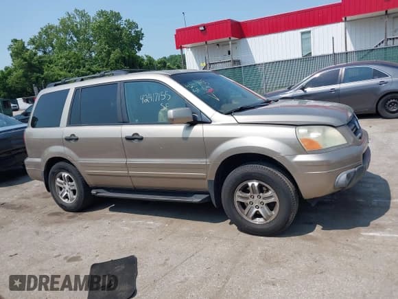 ✅ 2005 Honda Pilot EX-L • VIN: 2HKYF187X5H558246 • Lot: 42417155. Listed on IAAI with 214,663 mi. Free auction sales archive from the USA and detailed vehicle history report at DreamBid. Image 13.