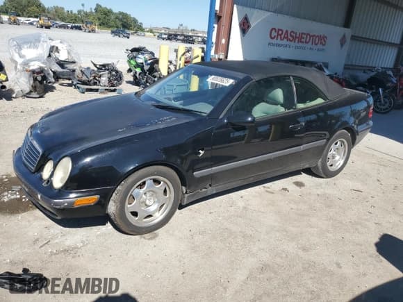 ✅ 1999 Mercedes-Benz CLK 320/430 • VIN: WDBLK65G7XT019572 • Lot: 90828625. Listed on Copart with 189,201 mi. Free auction sales archive from the USA and detailed vehicle history report at DreamBid. Image 1.