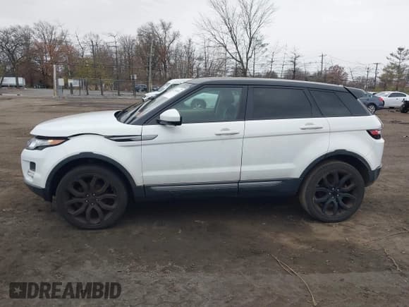 ✅ 2015 Land Rover Range Rover Evoque Pure Premium • VIN: SALVR2BG3FH037368 • Lot: 43796010. Wystawiony na IAAI z przebiegiem 119 994 mil. Bezpłatny archiwum sprzedaży aukcyjnych z USA i szczegółowy raport historii pojazdu na DreamBid. Zdjęcie 14.