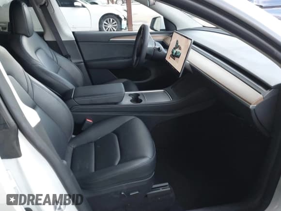 ✅ 2023 Tesla Model Y Long Range • VIN: 7SAYGAEE0PF787216 • Lot: 41589954. Listed on IAAI with 17,985 mi. Free auction sales archive from the USA and detailed vehicle history report at DreamBid. Image 5.