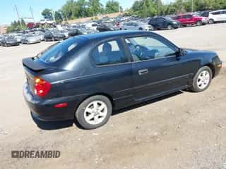 2004 Hyundai Accent GL z VIN KMHCG35C94U279813, wystawiony jako IAAI lot #43026155 z przebiegiem 42 020 mil mil oraz . Historia ofert i sprzedaży dostępna na DreamBid. Obrazek 4.