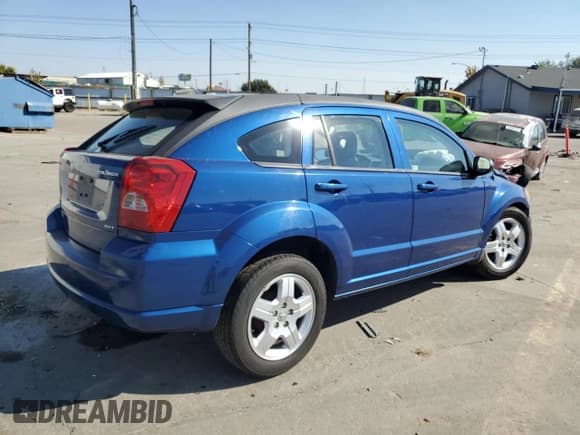 ✅ 2009 Dodge Caliber SXT • VIN: 1B3HB48A99D132084 • Лот: 76085644. Опубликован ранее на Copart с пробегом Не указан. Бесплатный доступ к архиву аукционных продаж из США и подробный отчёт об истории автомобиля на DreamBid. Изображение 3.