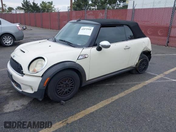 ✅ 2009 MINI Convertible S • VIN: WMWMS33529TG89023 • Lot: 42072518. Listed on IAAI with 127,735 mi. Free auction sales archive from the USA and detailed vehicle history report at DreamBid. Image 2.