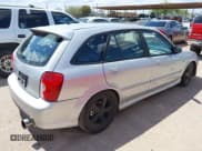 ✅ 2003 Mazda Protege • VIN: JM1BJ245731221133 • Lot: 42398641. Wystawiony na IAAI z przebiegiem 218 108 mil. Bezpłatny archiwum sprzedaży aukcyjnych z USA i szczegółowy raport historii pojazdu na DreamBid. Zdjęcie 4.