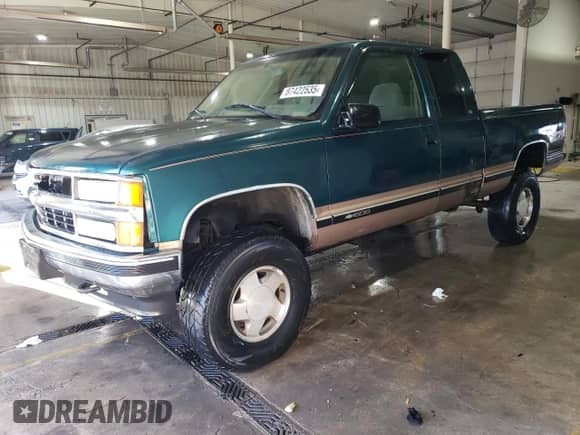 1998 Chevrolet Silverado 1500 with VIN 1GCEK19RXWE115952, listed as a Copart auction lot 87422535 with 248,499 mi miles and Salvage title. Bid and sale history available at DreamBid. Image 1.