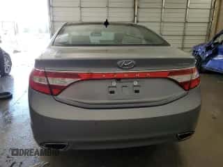 2014 Hyundai Azera Limited z VIN KMHFH4JG7EA411172, wystawiony jako Copart lot #42776985 z przebiegiem 144 038 mil mil oraz Szkoda całkowita • Salvage title. Historia ofert i sprzedaży dostępna na DreamBid. Obrazek 6.